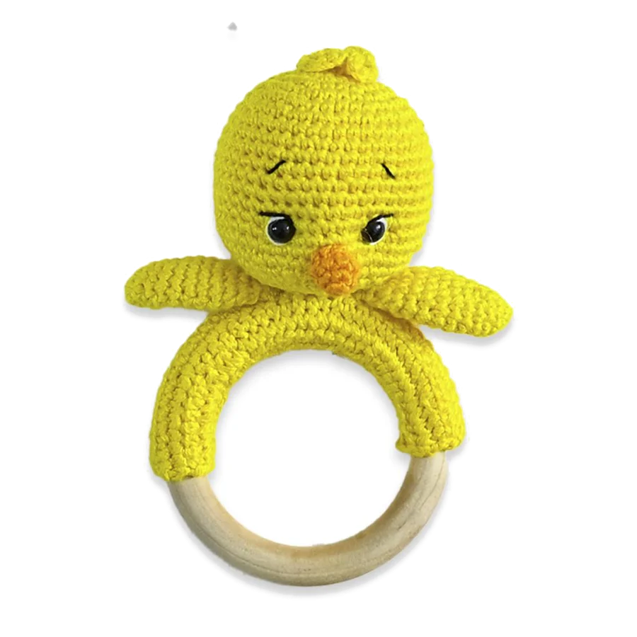 A yellow crochet chick rattle